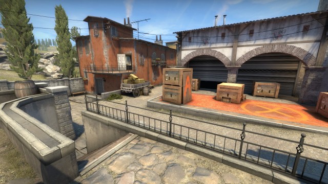 Inferno's A Bomb Site, met de speler die op Graveyard staat en naar de site, Short en Apartments kijkt.